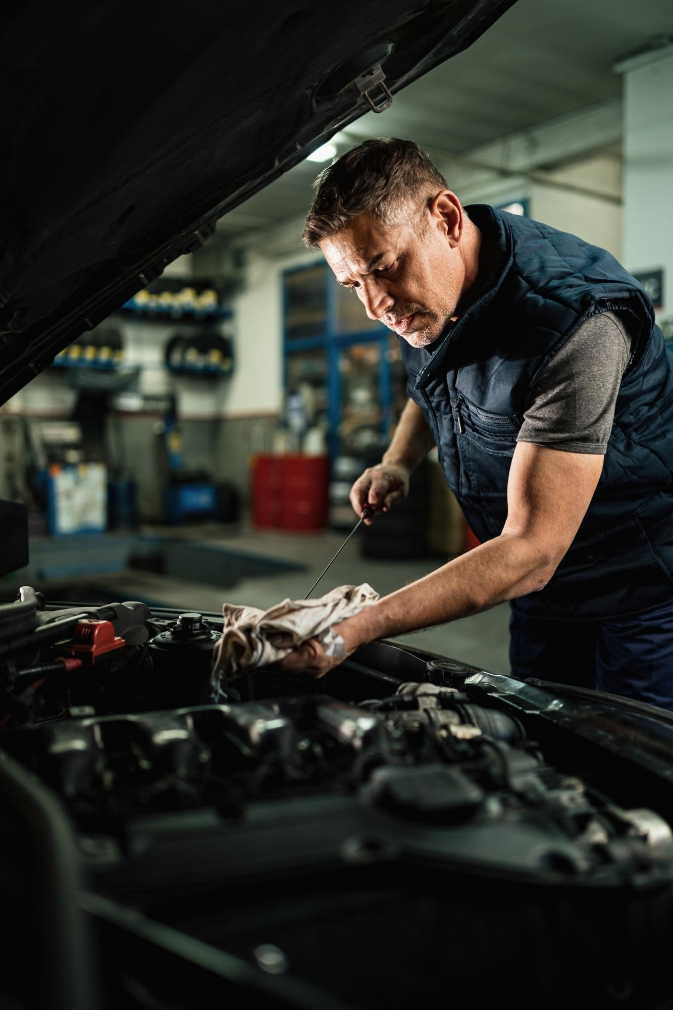 Mechanic working on vehicle